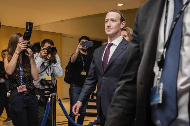 Facebook CEO Mark Zuckerberg leaves the EU Parliament in Brussels on Tuesday, May 22, 2018. [Photo: AP]