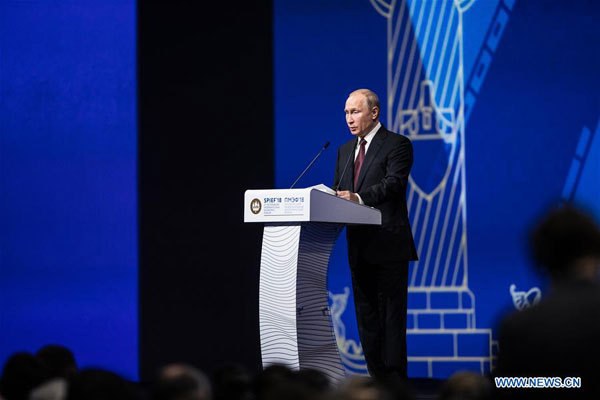 Russian President Vladimir Putin addresses a plenary session during the 22nd St. Petersburg International Economic Forum (SPIEF) in St. Petersburg, May 25th, 2018. The 22nd St. Petersburg International Economic Forum (SPIEF) opened in St. Petersburg on Thursday with senior officials and business tycoons meeting to seek cooperation. [Photo: Xinhua/Wu Zhuang]