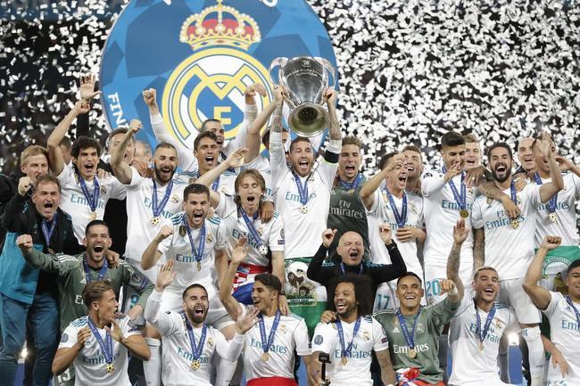 Real Madrid's players celebrate after winning the UEFA Champions League final game between Real Madrid and Liverpool FC at the NSC Olimpiyskiy stadium in Kiev, Ukraine, 26 May 2018. [Photo: IC]