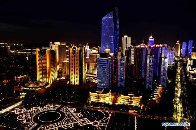 Photo taken on June 2, 2018 shows the night view near Wusi Square in Qingdao, east China's Shandong Province. The 18th Shanghai Cooperation Organization (SCO) Summit is scheduled for June 9 to 10 in Qingdao. [Photo: Xinhua]