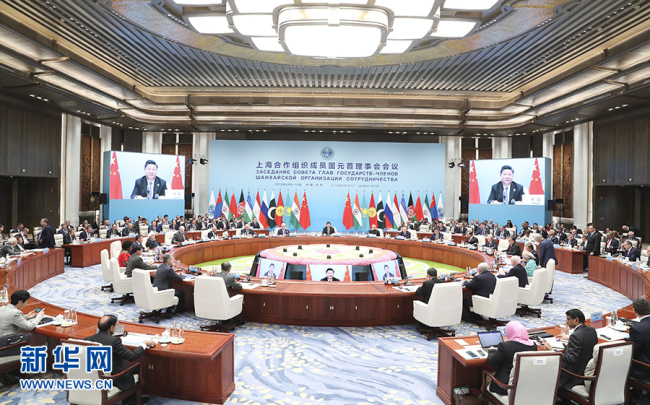 Chinese President Xi Jinping delivers a speech at the 18th Meeting of the Council of Heads of Member States of the Shanghai Cooperation Organization (SCO) in Qingdao, Shandong Province, on Sunday, June 10, 2018. [Photo: Xinhua]