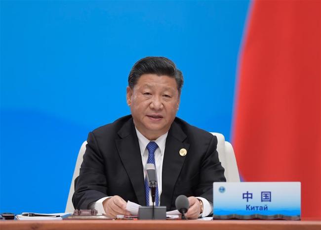 Chinese President Xi Jinping chairs the 18th Meeting of the Council of Heads of Member States of the Shanghai Cooperation Organization (SCO) in Qingdao, east China's Shandong Province, June 10, 2018. Xi delivered a speech during the meeting. [Photo: Xinua]