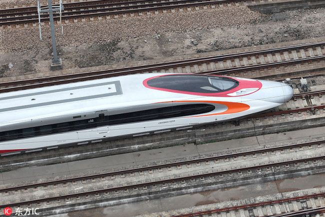 A MTR train of CRH (China Railway High-speed) runs on the Guangzhou-Shenzhen-Hong Kong Express Rail Link at the Shenzhen North Railway Station in Shenzhen city, south China's Guangdong province, May 14, 2018. [Photo: IC]