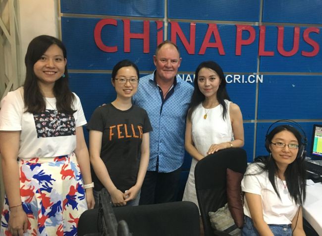 Mark Frood is the third on the left, International Tourism and Market Development Manager at the Auckland International Airport ltd.[Photo: from China Plus]