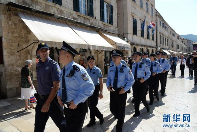 The first ever joint patrol between China and Croatia during tourist season is launched in Dubrovnik on July 15, 2018. [Photo: Xinhua]