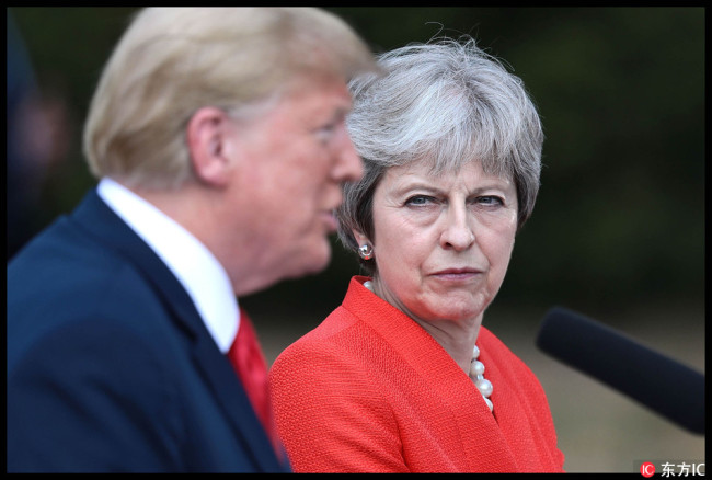 Britains's Prime Minister Theresa May holds a press conference with U.S. President Donald Trump at Chequers on July 13, 2018 in Aylesbury, England. [Photo: IC]