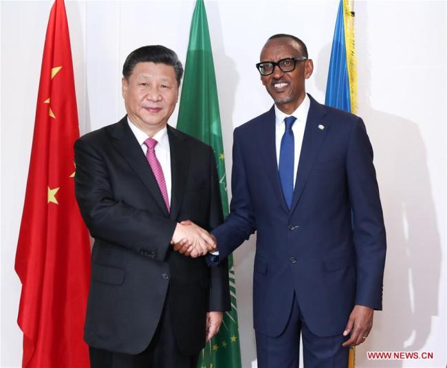 Chinese President Xi Jinping (L) holds talks with Rwandan President Paul Kagame in Kigali, Rwanda, July 23, 2018. [Photo: Xinhua/Pang Xinglei]