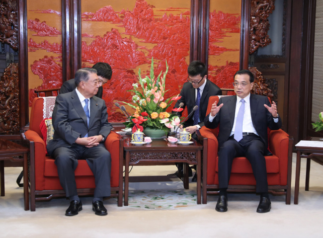 Chinese Premier Li Keqiang meets with Tadamori Oshima, speaker of the House of Representatives of the Japanese parliament in Beijing on Tuesday, July 24, 2018. [Photo: gov.cn]