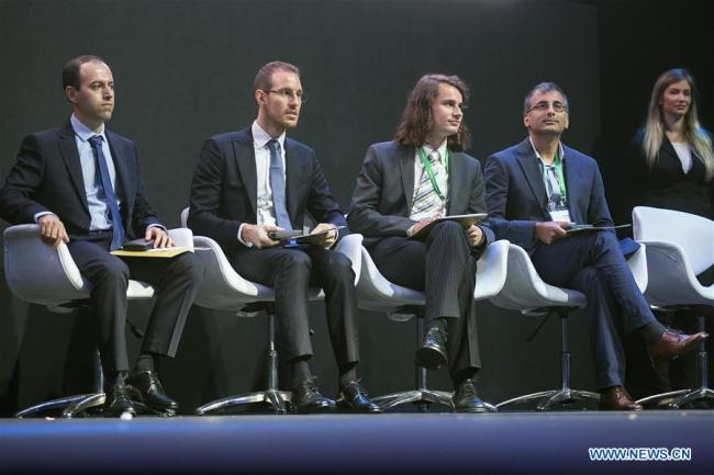The Fields Medal winners Caucher Birkar of Iran, Alessio Figalli of Italy, Peter Scholze of Germany and Akshay Venkatesh of India (L to R) are pictured during the opening ceremony of the 2018 International Congress of Mathematicians in Rio de Janeiro, Brazil, on Aug. 1, 2018. [Photo: Xinhua]