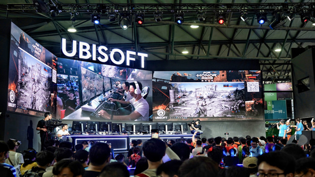 Visitors try out E-sports games during the 16th China Digital Entertainment Expo, also known as ChinaJoy 2018, in Shanghai, August 6.[Photo: China Plus]