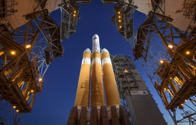The Mobile Service Tower is rolled back to reveal the United Launch Alliance Delta IV Heavy rocket with the Parker Solar Probe onboard, Saturday, Aug. 11, 2018, Launch Complex 37 at Cape Canaveral Air Force Station in Fla. [Photo: Bill Ingalls/NASA via AP]