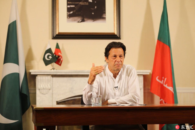 Newly elected Pakistani Prime Minister and leader of Pakistan Movement for Justice Imran Khan addresses to the nation after the general elections results are announced in Islamabad, Pakistan on July 26, 2018.[Photo: IC]