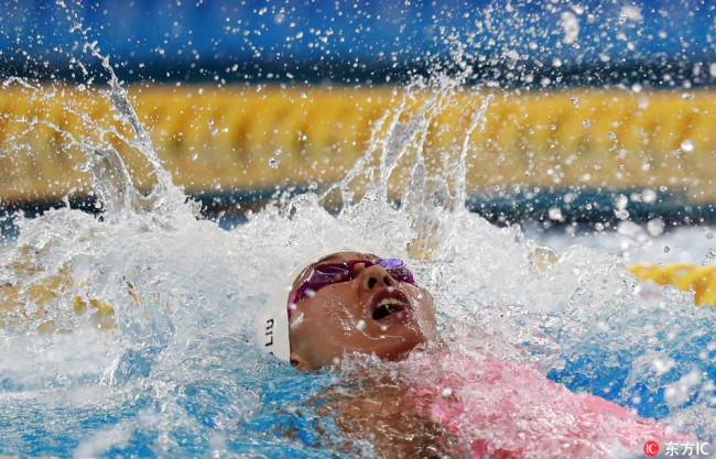 Liu Xiang of China is on her way to win the gold medal in the women's 50m Backstroke final of the Swimming events at the 2018 Asian Games in Jakarta, Indonesia, 21 August 2018. [Photo: IC]