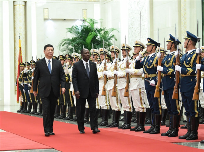 Chinese President Xi Jinping meets with Cote d'Ivoire's President Alassane Ouattara in Beijing on August 30, 2018. [Photo: Xinhua/Ju Peng]
