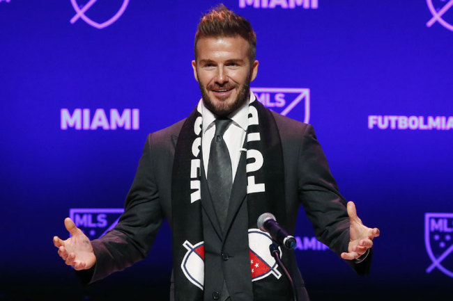 Former soccer player David Beckham addresses the media during an event to announce his Major League Soccer franchise in Miami, Florida on January 29, 2018. [Photo: AFP/RHONA WISE]