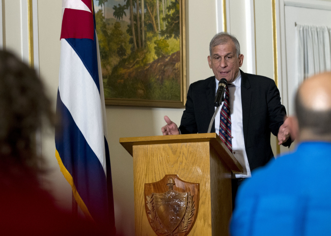 A member of a Cuban delegation, senior researcher Mitchell Joseph Valdes Sosa, speaks during a news conference about the mystery attacks on diplomats in Cuba at the cuban embassy in Washington, Thursday, Sept. 13, 2018. The US and Cuba are holding talks about the mysterious 'health attacks' on U.S. personnel at the embassy in Havana. [Photo: AP/Jose Luis Magana]