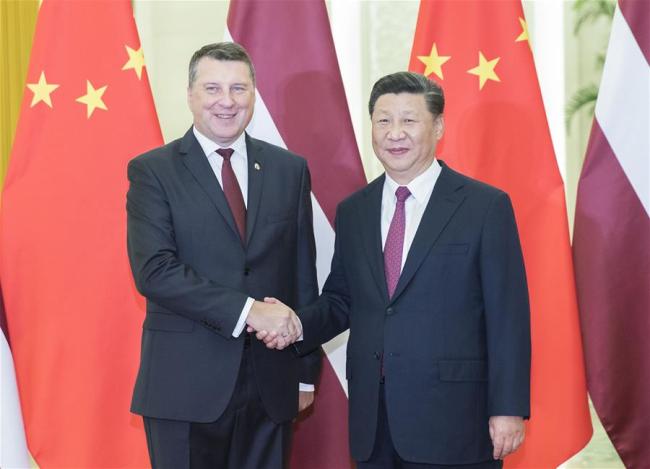 Chinese President Xi Jinping meets with his Latvian counterpart Raimonds Vejonis at the Great Hall of the People in Beijing, ept. 18, 2018. [Photo: Xinhua/Huang Jingwen]