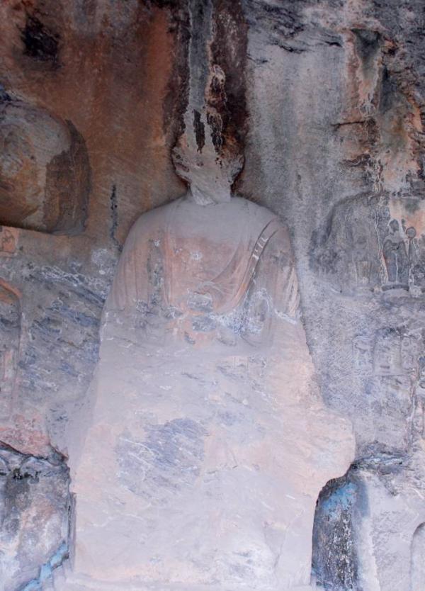 The status of the Buddha statue at the Longmen Grottoes [Photo provided by the Longmen Grottoes Research Institute]