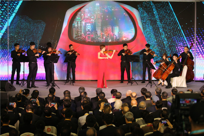 Musicians perform at Hong Kong's West Kowloon Station to celebrate the opening ceremony of the Hong Kong Section of the Guangzhou-Shenzhen-Hong Kong Express Rail Link, to be officiated at by the Chief Executive of the Hong Kong Special Administrative Region Carrie Lam Cheng Yuet-ngor and Governor of Guangdong province Ma Xingrui, Sept 22, 2018. [Photo: China Daily]
