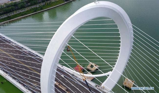 Aerial photo taken on Sept. 3, 2018 shows the main tower of Baisha Bridge under construction in Liuzhou, south China's Guangxi Zhuang Autonomous Region. (Xinhua/Li Hanchi)