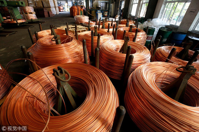 Copper rods are seen at a factory. [File Photo: VCG]
