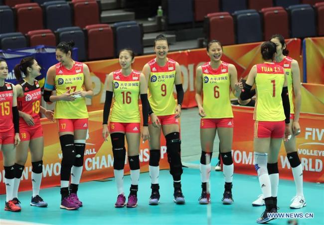 Players of China react ahead of the Pool F match against the United States at the 2018 Volleyball Women's World Championship in Osaka, Japan, Oct. 10, 2018. China won 3-0. [Photo: Xinhua/Du Xiaoyi]