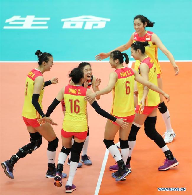 Players of China celebrate during the Pool F match against the United States at the 2018 Volleyball Women's World Championship in Osaka, Japan, Oct. 10, 2018. China won 3-0. [Photo: Xinhua/Du Xiaoyi]