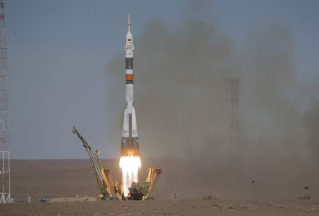 The Soyuz-FG rocket booster with Soyuz MS-10 space ship carrying a new crew to the International Space Station, ISS, blasts off at the Russian leased Baikonur cosmodrome, Kazakhstan, Thursday, Oct. 11, 2018. Two astronauts from the U.S. and Russia are making an emergency landing after a Russian booster rocket carrying them into orbit to the International Space Station has failed after launch. [Photo: AP/Dmitri Lovetsky]