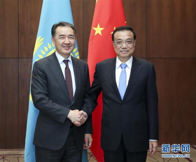 Chinese Premier Li Keqiang meets with Kazakh Prime Minister Bakytzhan Sagintayev in the Tajik capital city of Dushanbe on October 11, 2018. [Photo: Xinhua]
