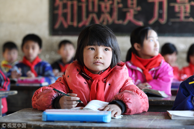 Primary students study at a rural school.[File Photo: VCG]