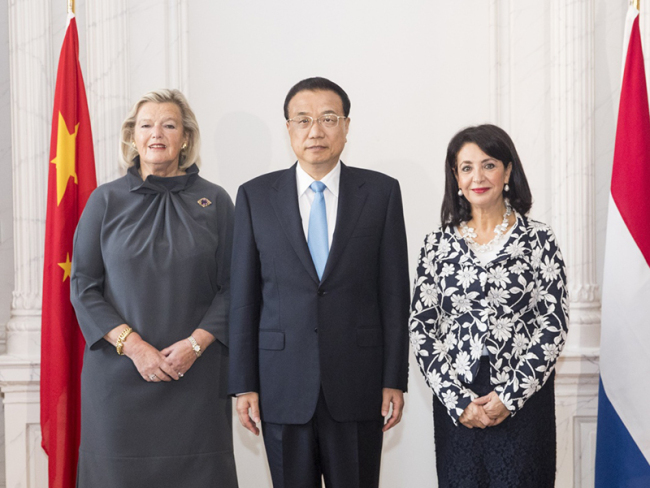 Chinese Premier Li Keqiang meets with Ankie Broekers-Knol, president of the Senate, and Khadija Arib, president of the House of Representative of the Netherlands in The Hague, the Netherlands, on Tuesday, Oct 16, 2018.[Photo: Xinhua]