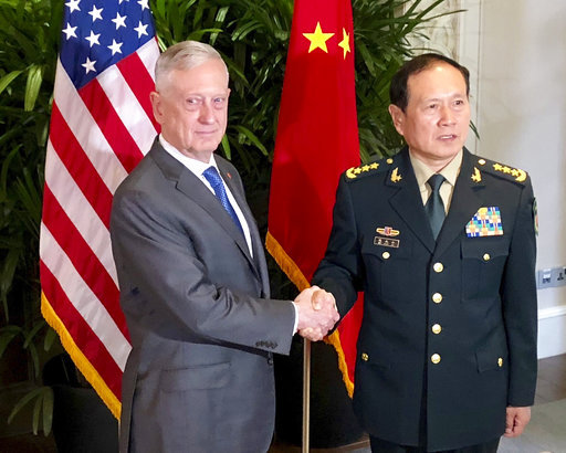 Chinese State Councilor and Minister of National Defense Wei Fenghe meets with United States Secretary of Defense James Mattis on October 18, 2018, in Singapore. [Photo: AP]