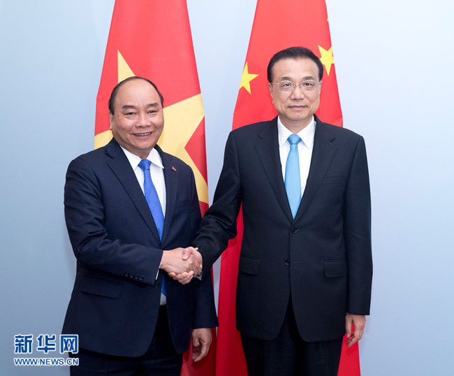 Chinese Premier Li Keqiang（right） and Vietnamese Prime Minister Nguyen Xuan Phuc.[Photo:Xinhua]
