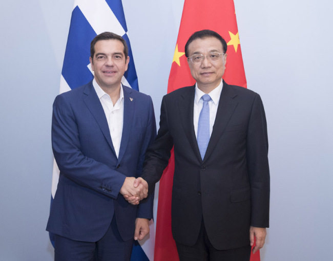 Premier Li Keqiang meets with his Greek counterpart, Alexis Tsipras on the sidelines of the 12th Asia-Europe Meeting Summit in Brussels, on October 19, 2018. [Photo: Xinhua]
