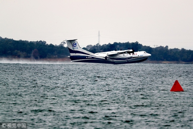 China's first large water plane, the AG600, completes first water surface test flight on October 20, 2018, in Jingmen of central China's Hubei Province. [Photo: VCG]