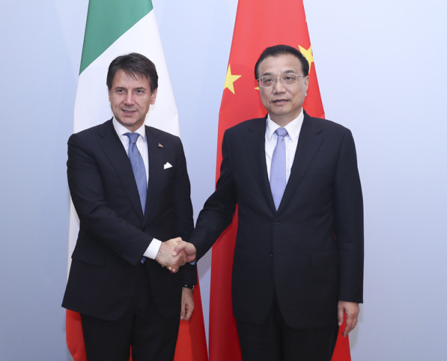 Premier Li Keqiang meets with Italian Prime Minister Giuseppe Conte on the sidelines of the 12th Asia-Europe Meeting Summit in Brussels, on October 19, 2018. [Photo: Xinhua]