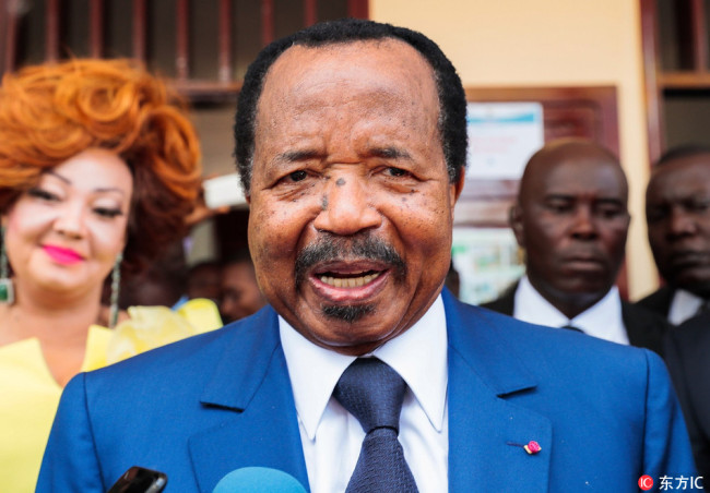 Cameroon's President and head of Cameroon People's Democratic Movement Paul Biya speaks to media after casting his vote at a polling station during presidential elections in Yaounde, Cameroon on October 07, 2018. [File Photo: IC]