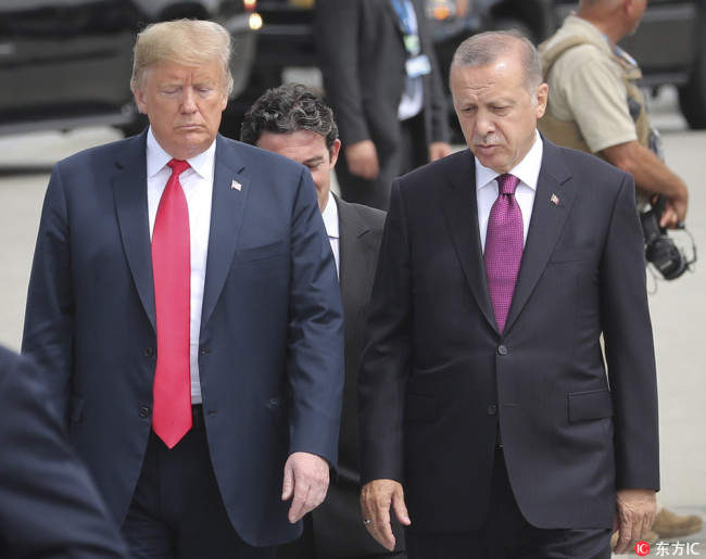 US President Donald J. Trump (L) and Turkey's President Recep Tayyip Erdogan (R) arrive for a family picture of Nato Summit in Brussels, Belgium, 11 July 2018. [File Photo:IC]