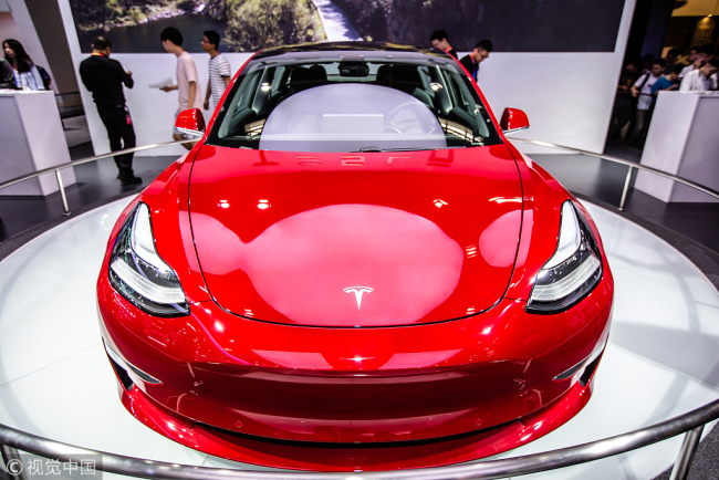 A Tesla Model 3 is on display at the Auto China 2018 in Beijing on April 30, 2018. [Photo: VCG]