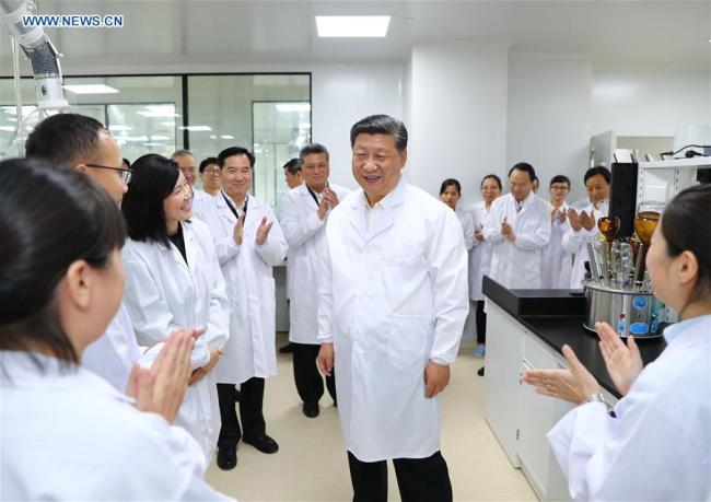 Chinese President Xi Jinping visits the Traditional Chinese Medicine Science and Technology Industrial Park of Co-operation between Guangdong and Macao in Zhuhai,Guangdong Province, Oct. 22, 2018. [Photo: Xinhua/Xie Huanchi]