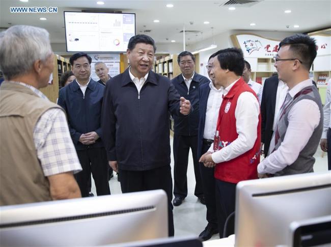 Chinese President Xi Jinping, also general secretary of the Communist Party of China Central Committee and chairman of the Central Military Commission, meets with social workers and residents of Beizhan Community in Longhua District in Shenzhen, south China's Guangdong Province, during an inspection tour, Oct. 24, 2018. [Photo: Xinhua/Xie Huanchi]