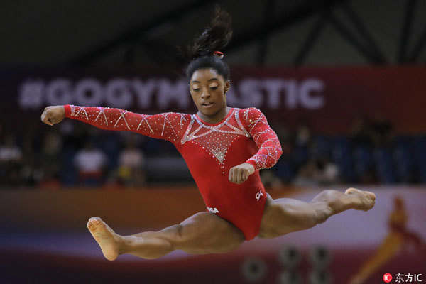 Gold medalist Simone Biles of the U.S. performs on the floor on the second and last day of the apparatus finals of the Gymnastics World Championships at the Aspire Dome in Doha, Qatar, Saturday, November 3, 2018. [Photo: Imagine China]