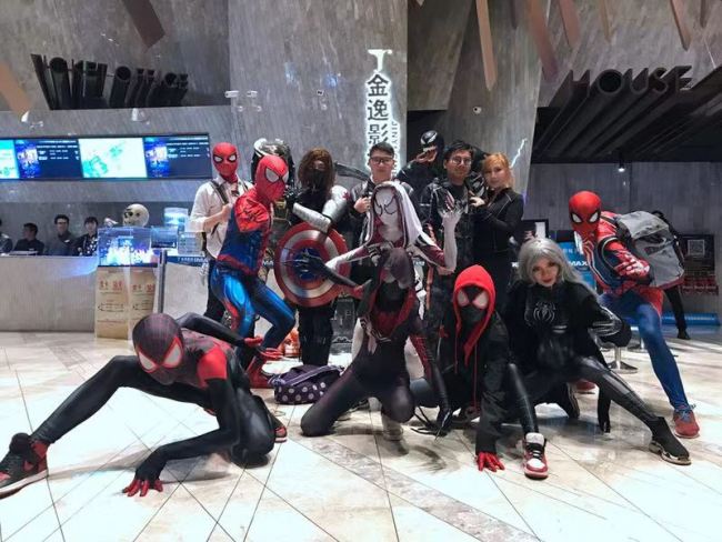 Fans cosplay spider-men at the premiere of the film Venom in Beijing on Sunday, Nov 4, 2018. [Photo provided to China Plus]