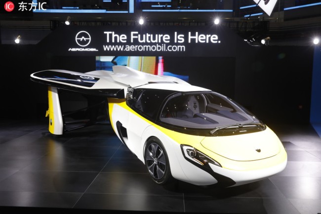 An AeroMobil 5.0 VTOL, a concept flying car for future electric 4-seater flying taxi combining flight with driving capability, is on display during the First China International Import Expo (CIIE) in Shanghai, China, 5 November 2018.