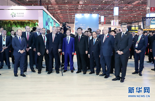 Chinese President Xi Jinping and foreign leaders who are attending the first China International Import Expo Monday tour around the Country Pavilion for Trade and Investment, Shanghai, November 5 2018. [Photo:Xinhua]