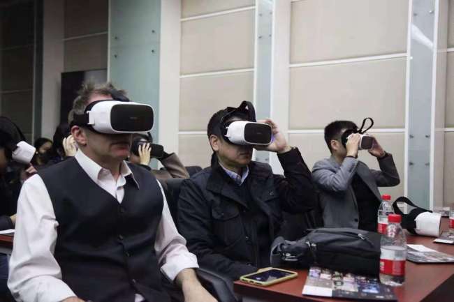 Audiences wearing virtual reality glasses watch the Australian-Chinese feature film "The Calling" in Beijing on Friday, November 2, 2018.[Photo provided to China Plus]