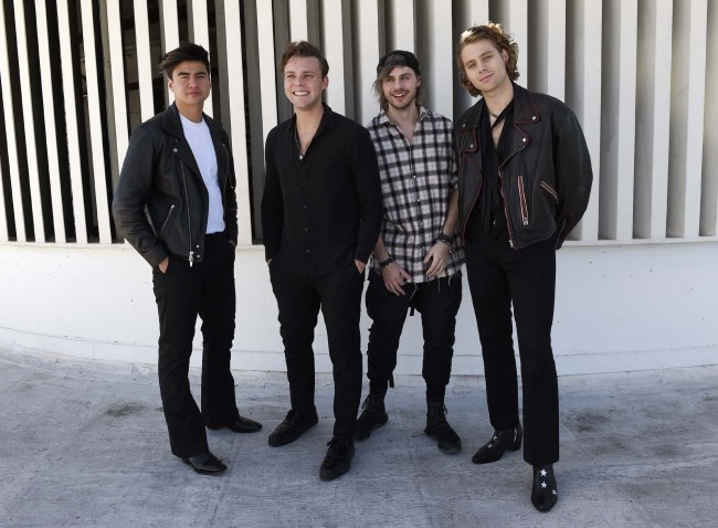 This Oct. 18, 2018 photo shows members of the band 5 Seconds of Summer, from left, Calum Hood, Ashton Irwin, Michael Clifford and Luke Hemmings posing at Capitol Records in Los Angeles to promote their third album "Youngblood." [Photo: AP]