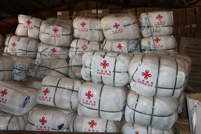  Photo taken on November 20, 2018 shows loads of relief items from China stored in a warehouse to assist the refugees in Zimbabwe’s Tongogara Refugee Camp. [Photo: China Plus/Gao Junya]