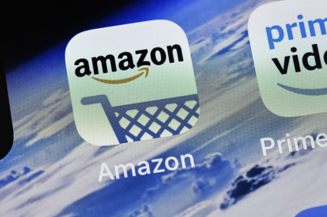 The icon of Amazon is pictured on an iPhone on Thursday, Nov. 15, 2018 in Gelsenkirchen, Germany. [Photo: AP]
