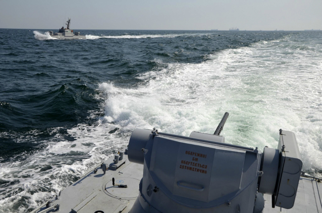 In this file photo taken and distributed by Ukrainian Navy Press Service on Sunday, Nov. 25, 2018, two Ukrainian forces navy ships are seen near Crimea. [Photo: AP]